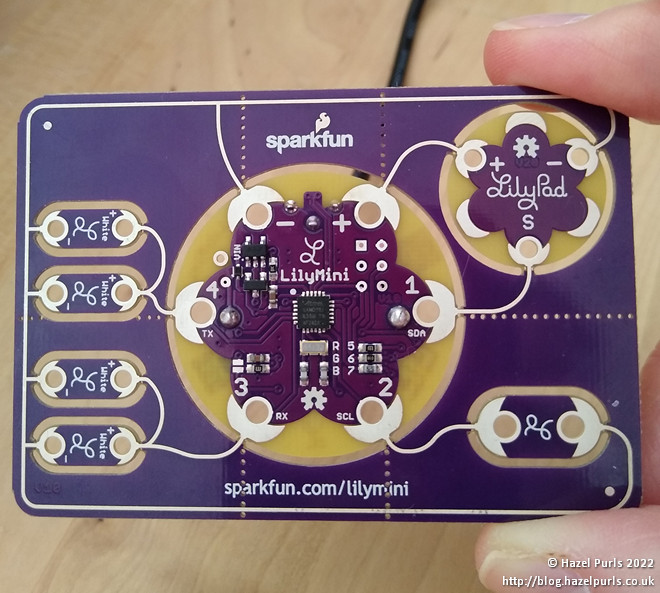 Photo showing the back of the LilyMini Protosnap board - 2 of the elements look like flowers.